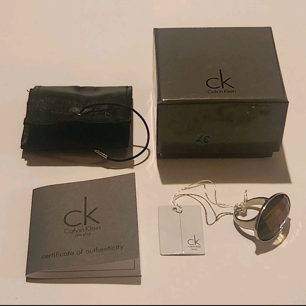 Calvin Klein Purple Crystal Ring Stainless Steel Size 7 NIB Continuity Statement